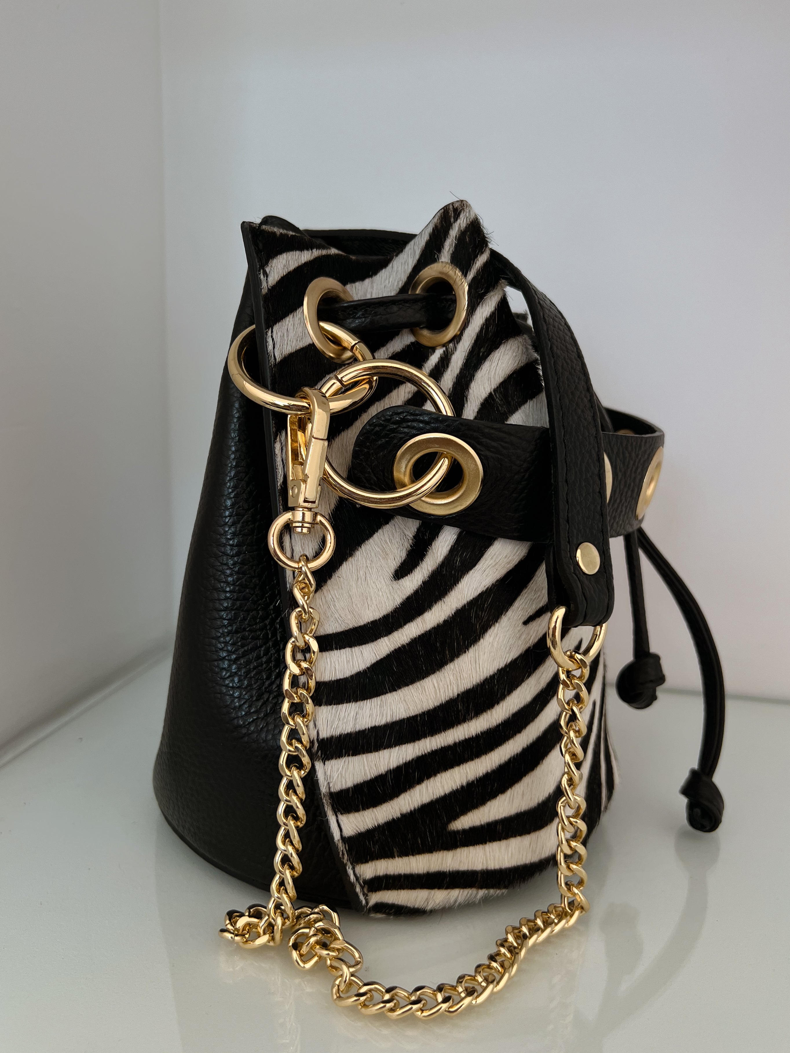 BOLSO DE PIEL CON ESTAMPADO ANIMAL