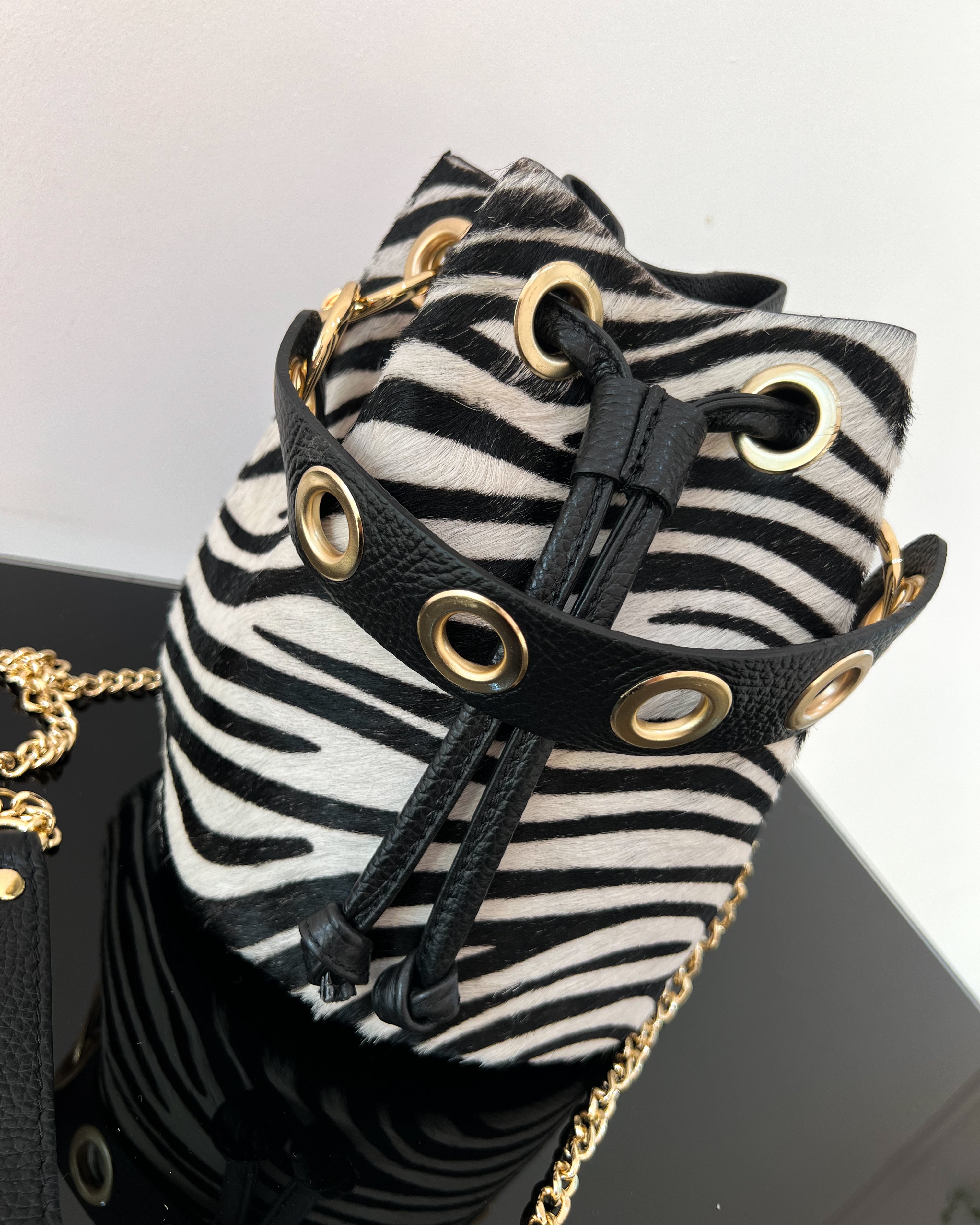 BOLSO DE PIEL CON ESTAMPADO ANIMAL