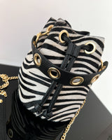 BOLSO DE PIEL CON ESTAMPADO ANIMAL