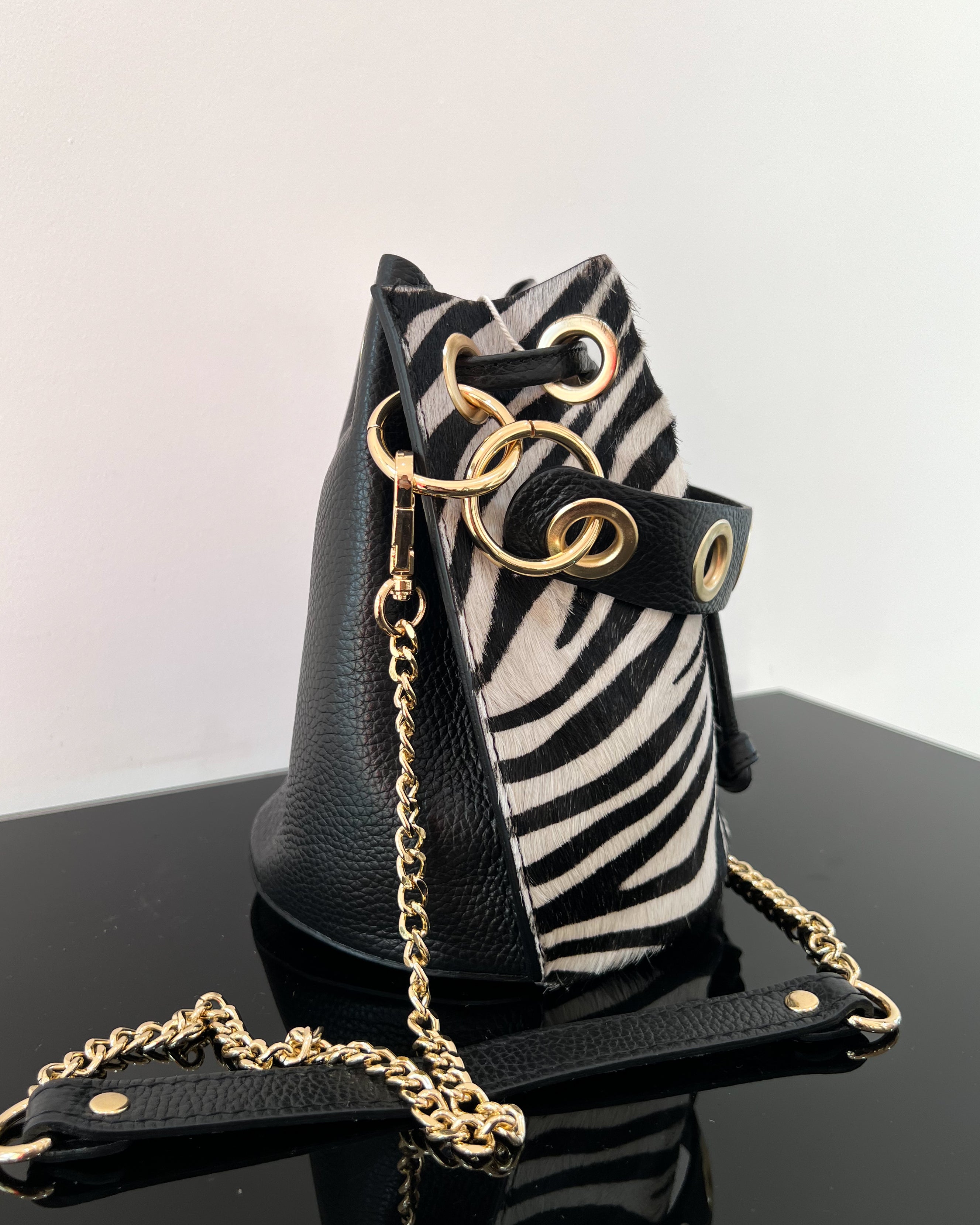 BOLSO DE PIEL CON ESTAMPADO ANIMAL