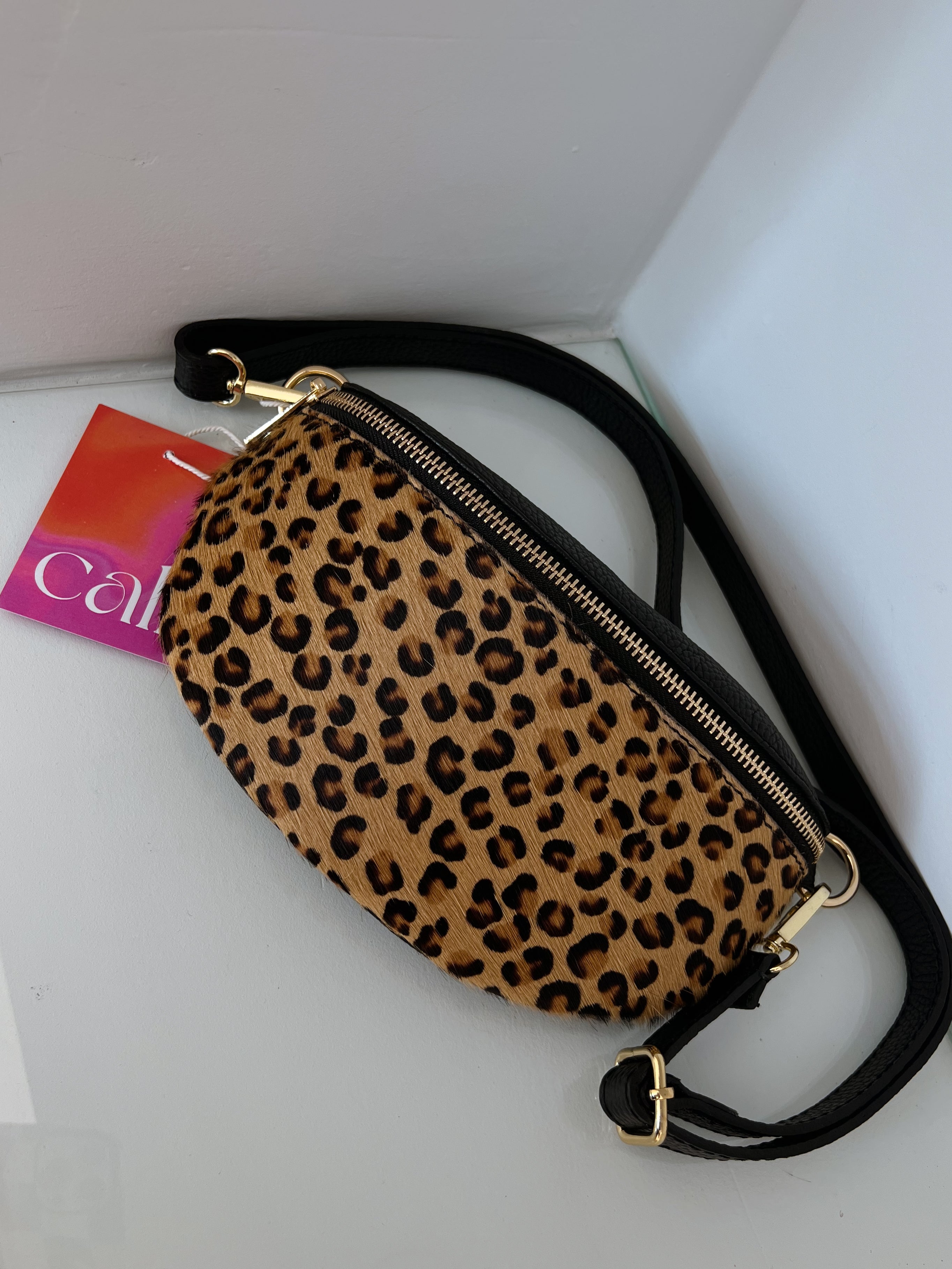 RIÑONERA ESTAMPADO ANIMAL